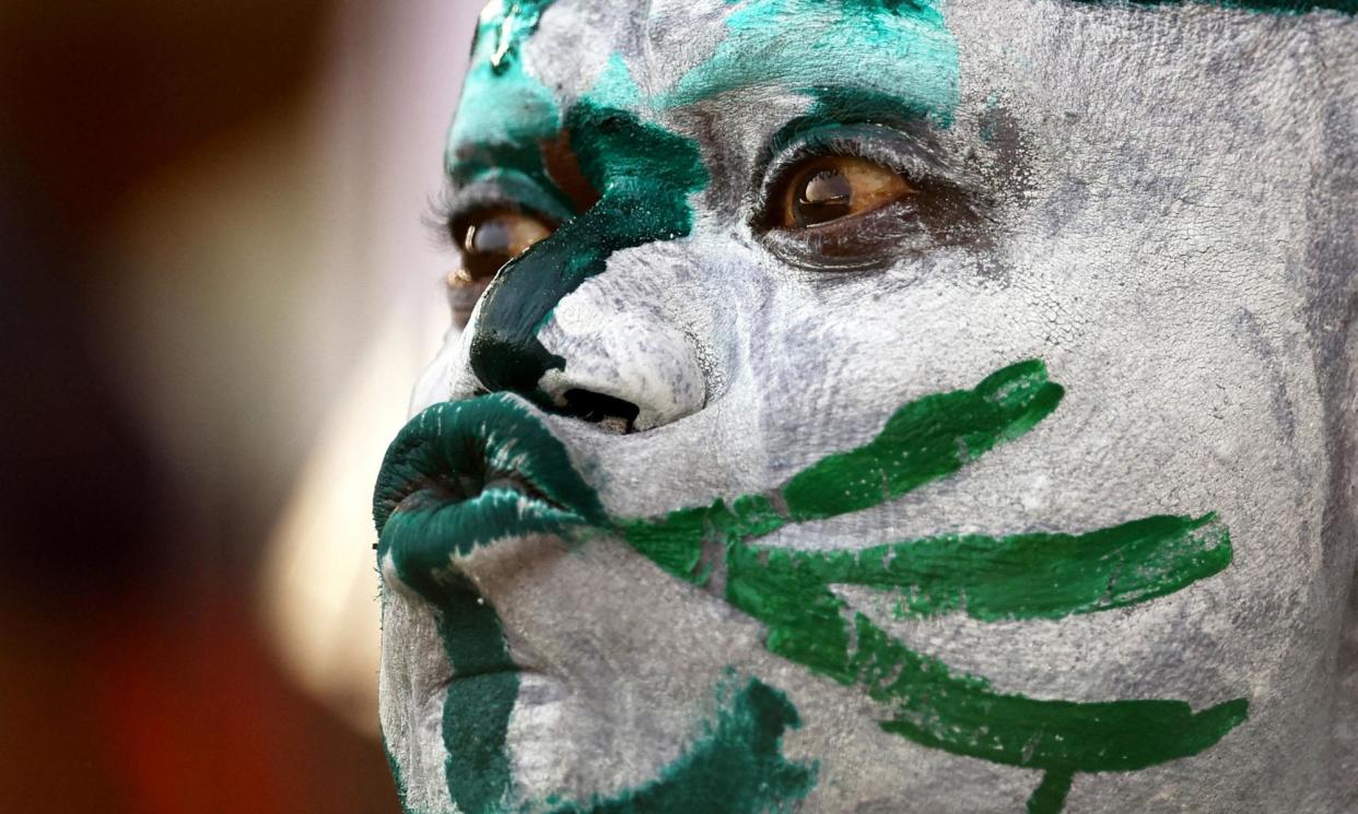 <span>A Nigeria fan sees his team beat South Africa in the semi-finals of the Africa Cup of Nations. His team can win a fourth trophy to join Ghana as the joint-third most successful side in the tournament’s history.</span><span>Photograph: Siphiwe Sibeko/Reuters</span>