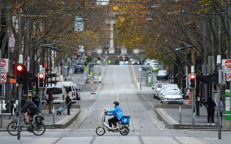 Central Melbourne was almost deserted on Tuesday - EPA