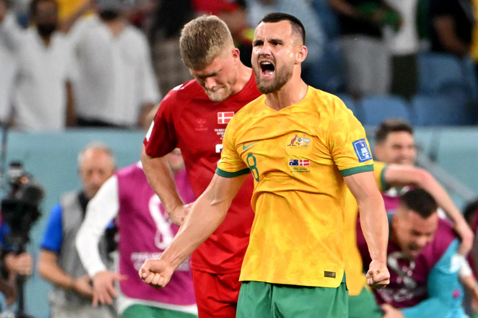 Bailey Wright is pictured here celebrating after the Socceroos beat Denmark at the FIFA World Cup.
