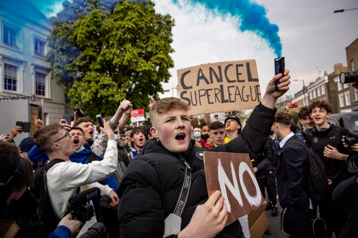 Chelsea fans protested against the Super League but the Premier League’s spending threatens to tear the game apart (Getty Images)
