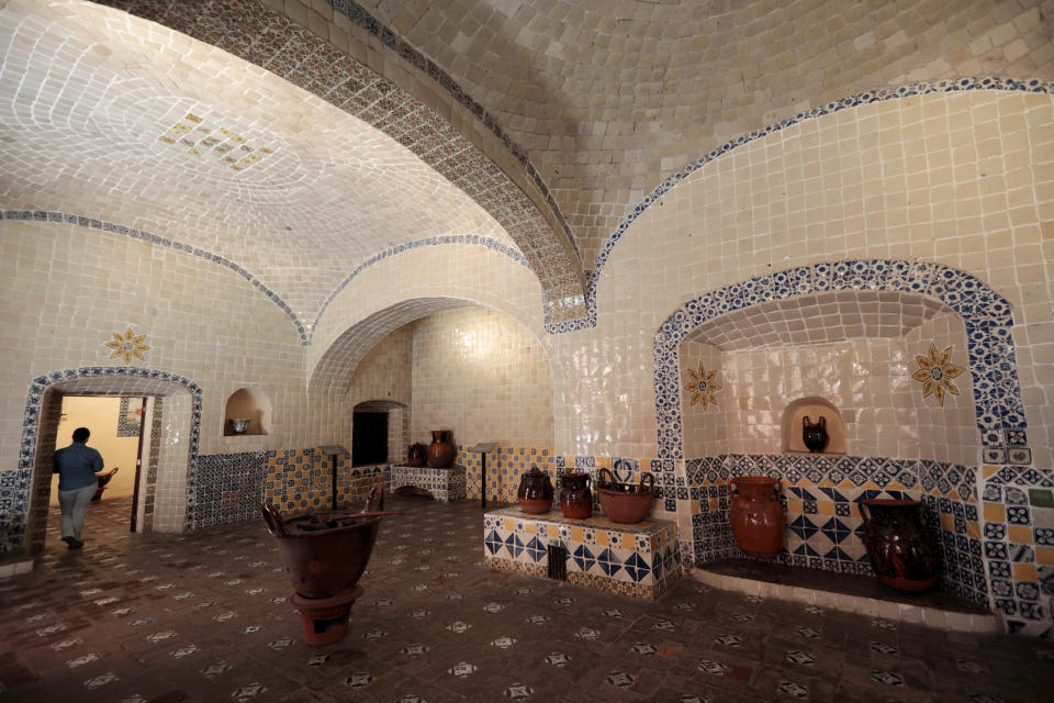 A view of the kitchen at the Santa Rosa art museum, in Puebla, Mexico, Monday Sept. 12, 2022. More than 300 years ago the former convent housed Dominican nuns. A nun at Santa Rosa invented mole poblano, a thick brown sauce, which is often served over turkey or chicken. (AP Photo/Pablo Spencer)