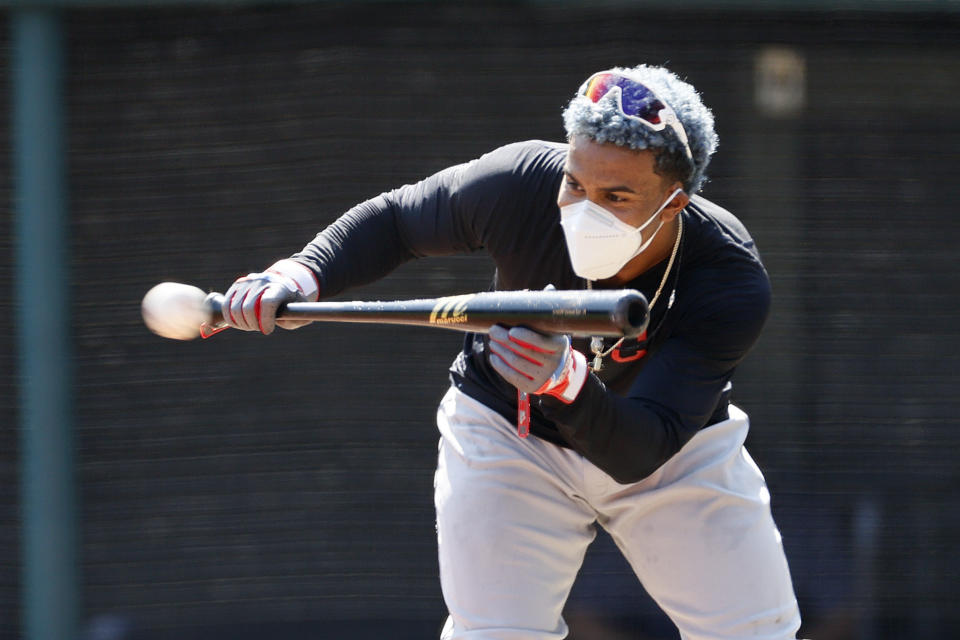 Cleveland Indians' Francisco Lindor bunts during baseball practice at Progressive Field, Monday, July 6, 2020, in Cleveland. (AP Photo/Ron Schwane)