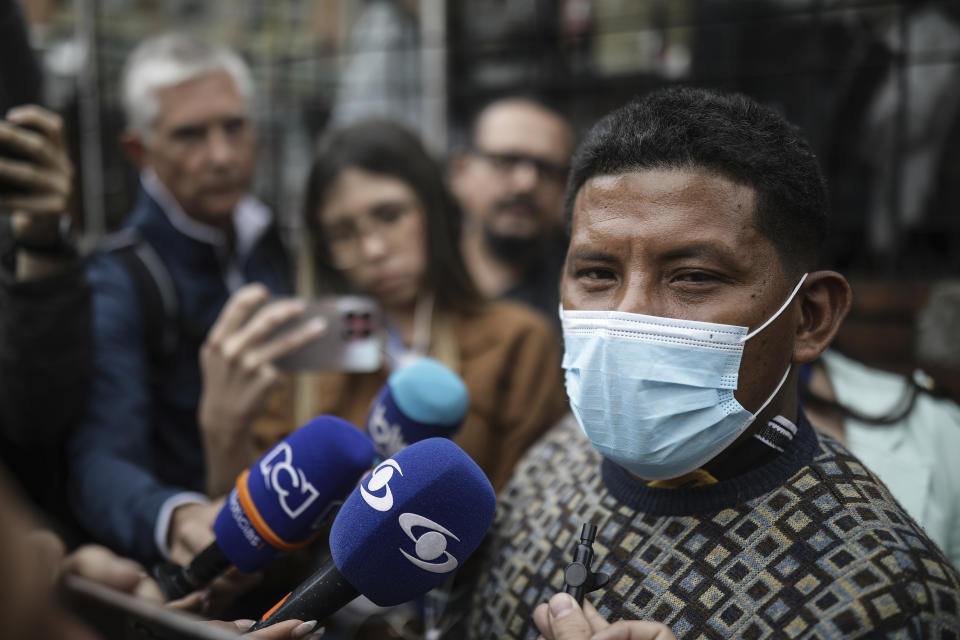 Manuel Ranoque, the father of two of the youngest Indigenous children who survived an Amazon plane crash that killed three adults, and then braved the jungle for 40 days before being found alive, speaks to the media from the entrance of the military hospital where the children are receiving medical attention, in Bogota, Colombia, Sunday, June 11, 2023. (AP Photo/Ivan Valencia)