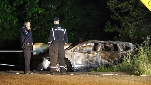 Vancouver police say this burnt-out vehicle was found near Sexsmith Elementary School shortly after the shooting in the River District. 