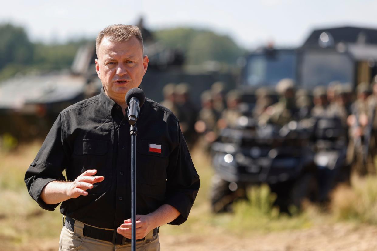 Poland’s Minister of Defense, Mariusz Blaszczak, holds a press conference in Jarylowka, Poland (AP)