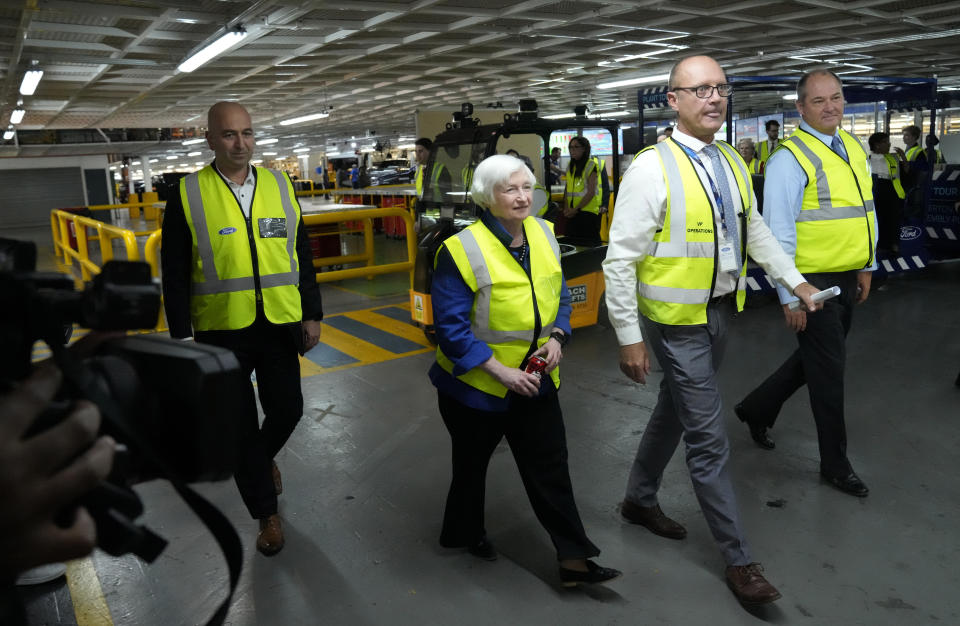 U.S. Treasury Secretary Janet Yellen, left, walks with Ockert Berry, second from right, and Neale Hill during her tour at the Ford Assembling Plant in Pretoria, South Africa, Thursday, Jan. 26, 2023. (AP Photo/Themba Hadebe)