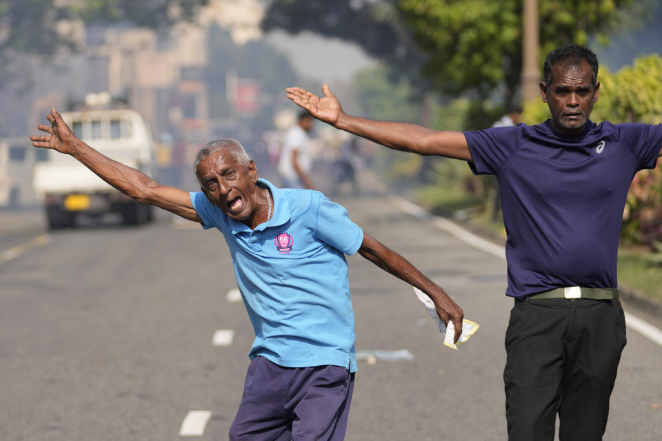 Supporter of Sri Lanka's main opposition shout slogans during a protest rally against high taxes and increases in electricity and fuel charges, in Colombo, Sri Lanka, Tuesday, Jan. 30, 2024. (AP Photo/Eranga Jayawardena)