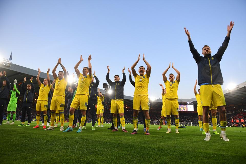 Ukraine players applaud their fans after defeating Scotland in a UEFA World Cup qualifying playoff at Hampden Park in Glasgow, Scotland.