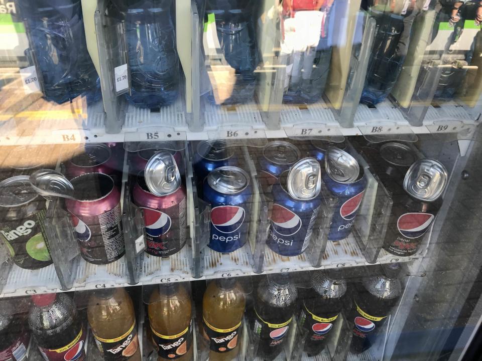 Destroyed cans in a vending machine