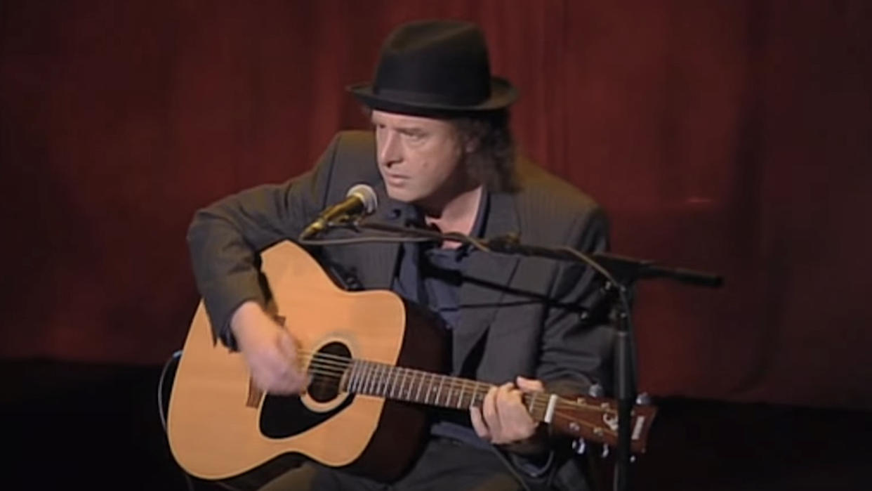  Steven Wright playing guitar in When The Leaves Blow. 