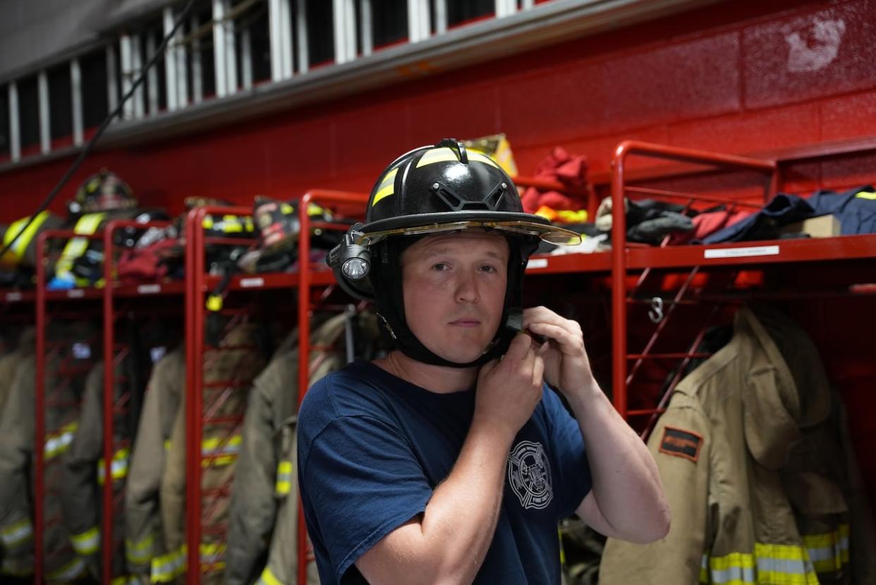 Stanislav Baranov is one of the newest members of the Corner Brook Fire Department, and moved to the region from Ukraine earlier this year. (Alex Kennedy/CBC - image credit)