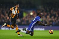 <p>Evandro brings down Victor Moses </p>