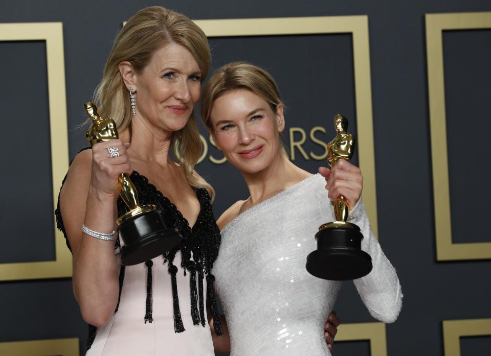 Laura Dern poses with the Oscar for Best Supporting Actress in a ``Marriage Story'' and Renee Zellweger with her Oscar for Best Actress for "Judy" in the photo room at the 92nd Academy Awards in Hollywood, Los Angeles, California, U.S., February 9, 2020. REUTERS/Lucas Jackson