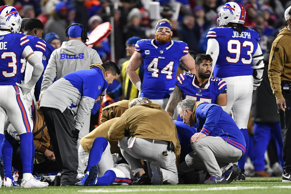 Buffalo Bills doctors examine Buffalo Bills safety Taylor Rapp who was injured on a play during the first half of an NFL football game against the New York Jets in Orchard Park, N.Y., Sunday, Nov. 19, 2023. Rapp was driven off the field in an ambulance. (AP Photo/Adrian Kraus)