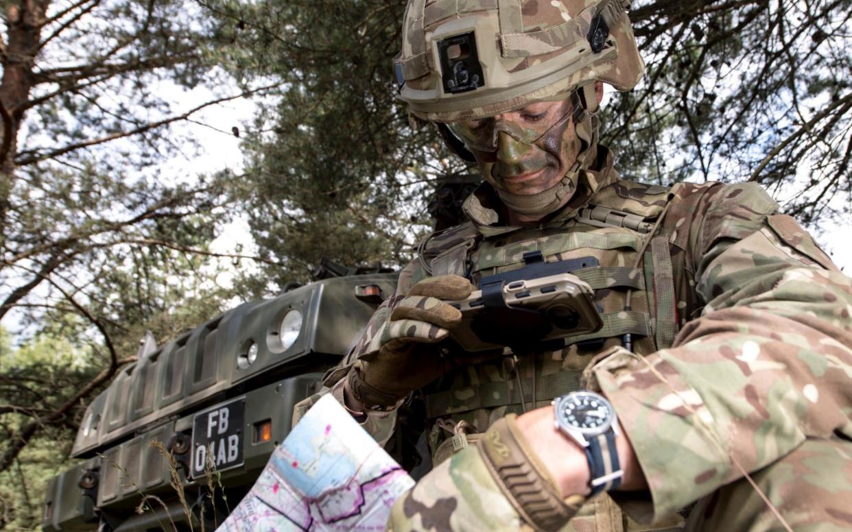 Major Ben Parkyn, from The Queen's Dragoon Guards, using the British Army's Dismounted Situational Awareness Tool - PA