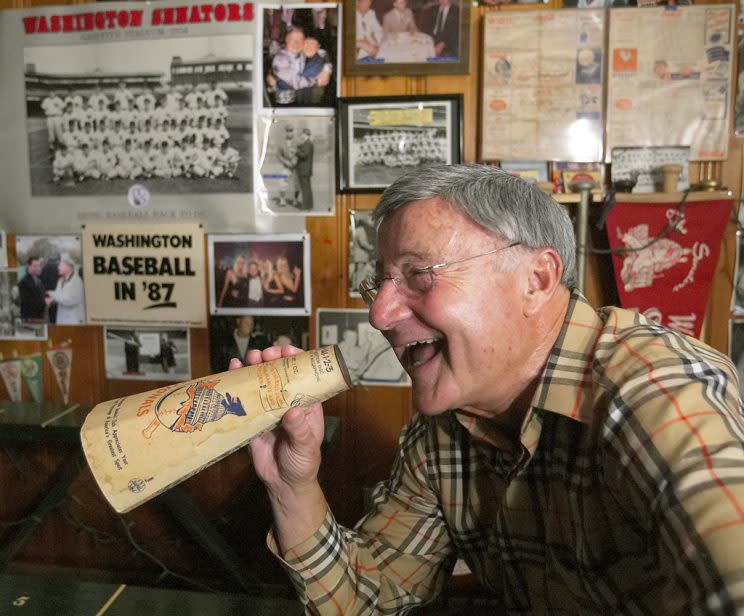 Charles Brotman reenacts some of his announcing days on October 22, 2004. (Len Spoden/The Washington Post via Getty Images)