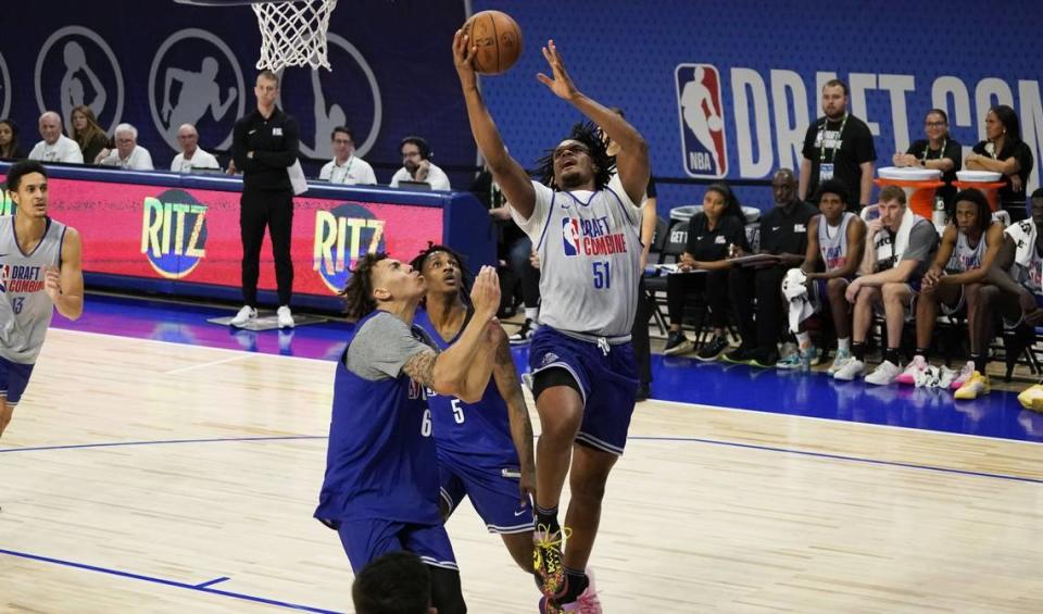 Dillon Jones (51) and Jamir Watkins (5) participate during the 2024 NBA Draft Combine at Wintrust Arena.