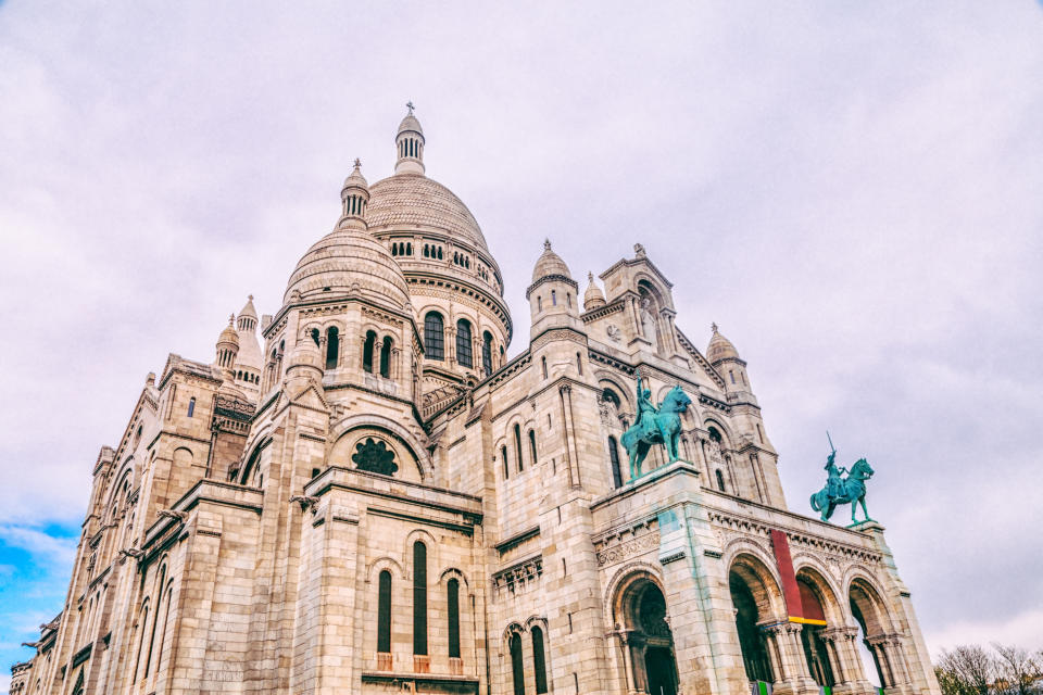 The Sacr&eacute;-C&oelig;ur sits atop the hill of Montmartre, Paris's artistic district. Not only is it one of the most important <a href="https://www.orbitz.com/blog/2017/04/europes-20-most-beautiful-churches/" target="_blank">European basilicas</a>, but it provides a breathtaking panoramic view of Paris' skyline. Visitors can climb 270 steps to the top of the Sacr&eacute;-C&oelig;ur for an unforgettable experience.