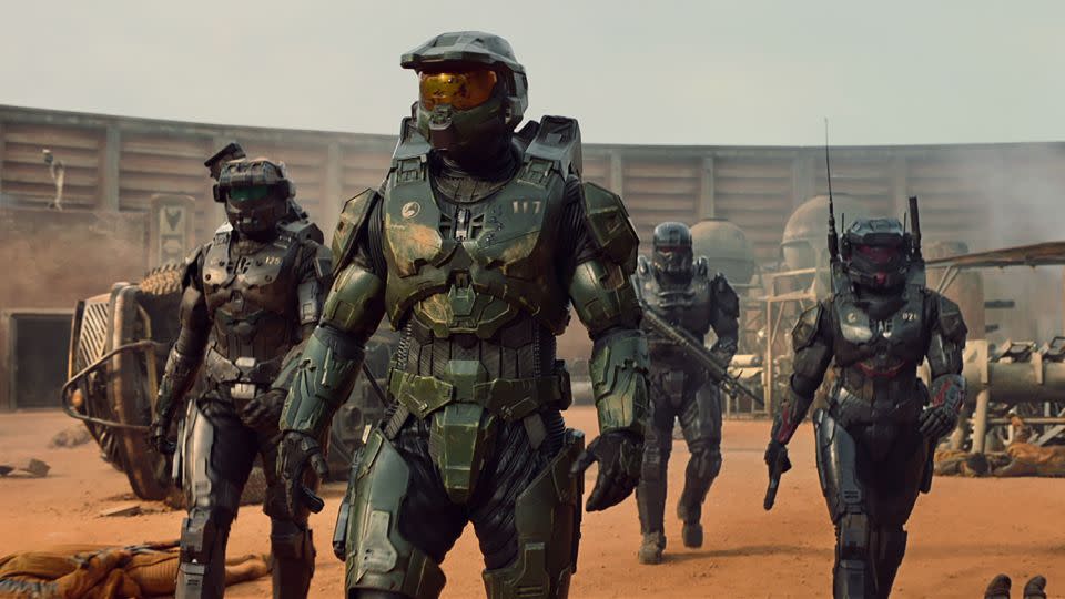 Pablo Schreiber as Master Chief, Kate Kennedy as Kai, Bentley Kalu as Vannak, and Natasha Culzac as Riz in 'Halo' Season 1. - Paramount+