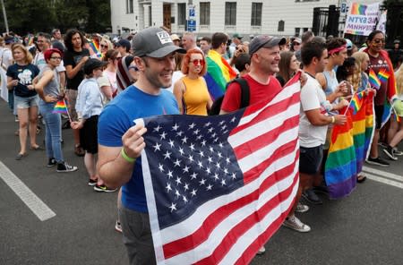 Participants of the Equality March, organized by the LGBT community, get ready in Kiev