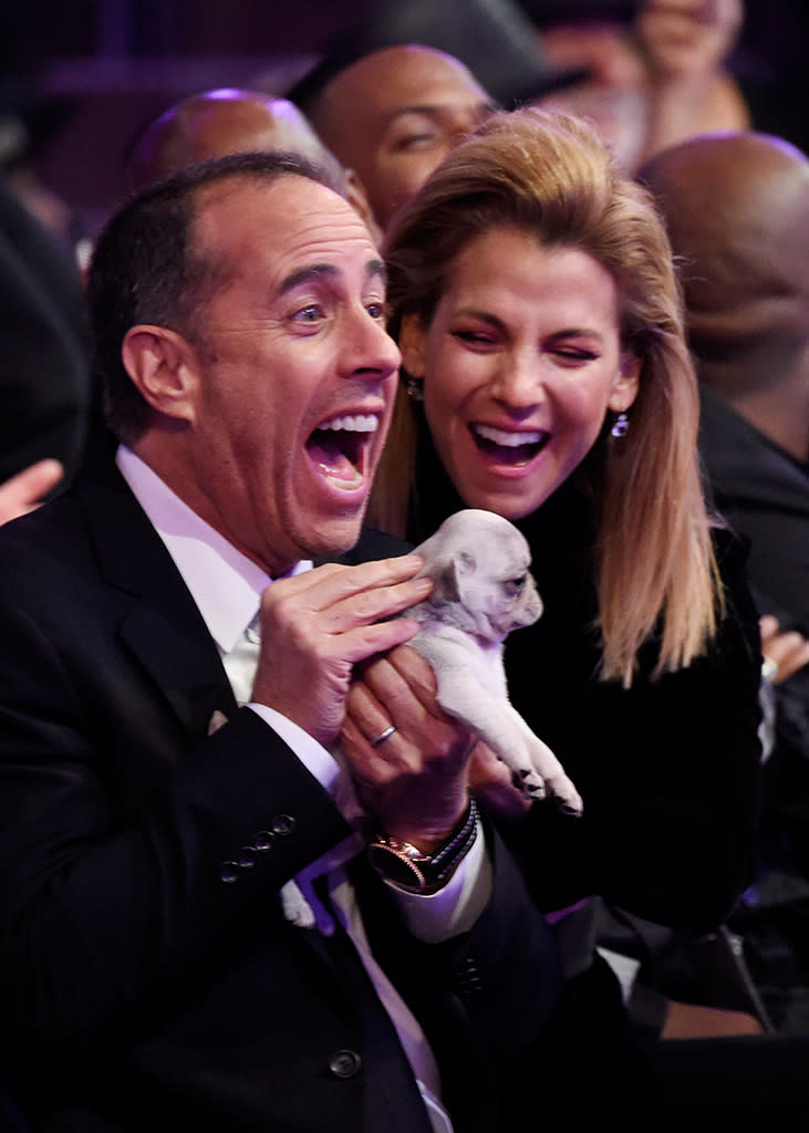 <p>The comedian and his wife were delighted with the “consolation puppy” that Grammys host James Corden gave Jerry Seinfeld at Sunday’s ceremony, after he lost out to Dave Chappelle in the Best Comedy Album category. (Photo: Kevin Mazur/Getty Images for NARAS) </p>