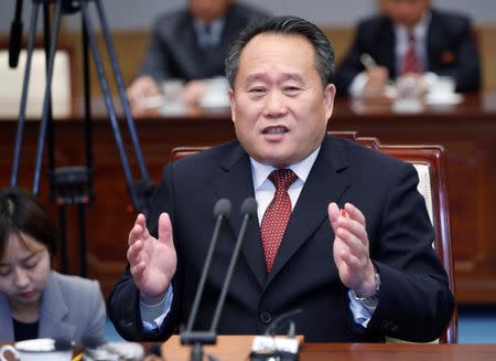 North Korea's Ri Son Gwon, chairman of the Committee for the Peaceful Reunification of the Country, talks with South Korean Unification Minister Cho Myoung-gyon during their meeting at the truce village of Panmunjom inside demilitarized zone, South Korea, October 15, 2018. Korea Pool/Yonhap via REUTERS