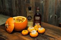 <p><strong>Ingredients</strong></p><p>9 oz Elijah Craig Small Batch Bourbon<br>4 oz Domaine De Canton Ginger Liqueur<br>3 tbs pumpkin puree<br>2 oz fall spice syrup*<br>6 oz apple juice<br>6 oz pineapple juice<br>6 oz lemon juice<br>5 thin sliced lemon wheel<br>3 thin sliced pineapple wheel</p><p><em>*Fall Spice Syrup</em><br>5 pieces star anise<br>2 tsp cardamom<br>1 tsp nutmeg<br>5 chopped diced ginger<br>1 whole orange twist<br>3 cinnamon sticks<br>3 cloves<br>2 cups of water<br>2 cups of fine sugar</p><p><strong>Instructions</strong></p><p>To make syrup, use a small saucepan over medium heat and lightly toast cardamom seeds. Combine with star anise, nutmeg, diced ginger, cinnamon stick, cloves, orange, water and sugar. Stir until sugar has completely dissolved. Let it cool for 30 minutes, and strain. Syrup can be stored in the refrigerator for up to 4 weeks. </p><p>Mix all cocktail ingredients together and add ice. Serve in mini harvest pumpkins or glass mugs and top with toasted meringue.</p><p><em>From Shawn Chen and Michael Hurson of <a href="https://www.decoynyc.com/" rel="nofollow noopener" target="_blank" data-ylk="slk:Decoy;elm:context_link;itc:0;sec:content-canvas" class="link ">Decoy</a> in New York</em></p>