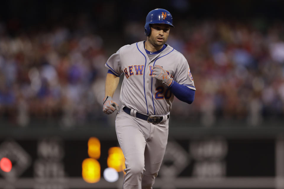 Neil Walker is back in the playoff race after being traded to the Milwaukee Brewers. (AP)