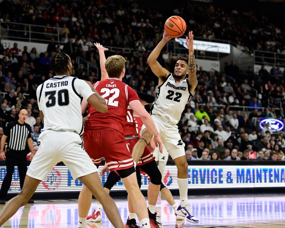 Providence guard Devin Carter shoots against  Wisconsin during a game on Nov. 14. The Friars' 72-59 win, in a Quadrant 1 game, helped them to a 61st rating in the first batch of NCAA NET rankings.