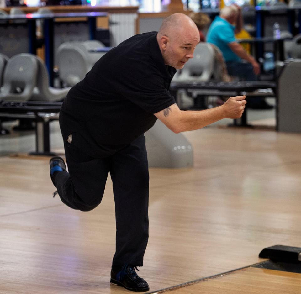 Steve Renaud will be inducted into the International Bowling Hall of Fame, here showing his form at Ryan Family Amusements in Millis, Oct. 18, 2023.