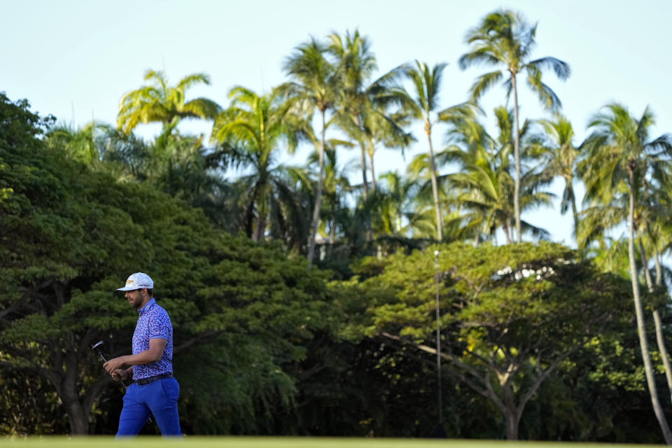 Erik van Rooyen walks off the 10th green during the second round of the Sony Open golf event, Friday, Jan. 12, 2024, at Waialae Country Club in Honolulu. (AP Photo/Matt York)