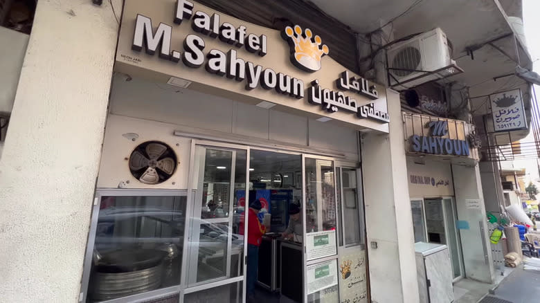 two falafel restaurants from outside