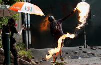 Anti-government demonstrators attend a protest march in Hong Kong