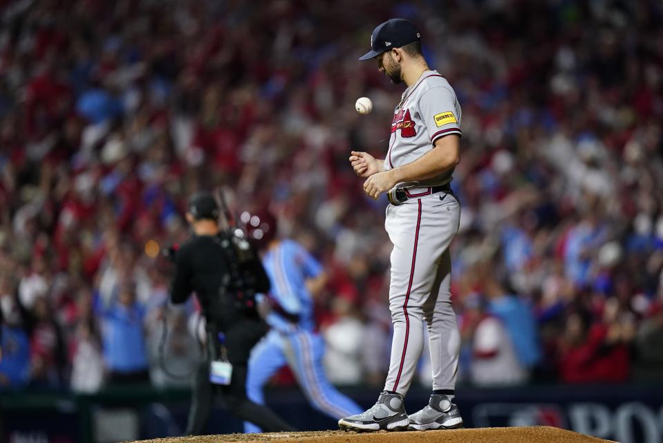 Atlanta Braves starting pitcher Spencer Strider reacts after giving up a home run to Philadelphia Phillies' Trea Turner during the fifth inning of Game 4 of a baseball NL Division Series Thursday, Oct. 12, 2023, in Philadelphia. (AP Photo/Chris Szagola)
