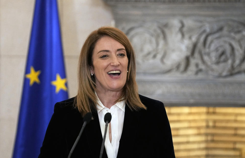 European Parliament President Roberta Metsola makes a statement with Greece's Prime Minister Kyriakos Mitsotakis after their meeting at Maximos Mansion in Athens, Greece, Tuesday, Feb. 20, 2024. Metsola is in Athens on Tuesday, as part of her campaign to raise awareness and encourage people to vote in the European Parliament elections in June. (AP Photo/Thanassis Stavrakis)