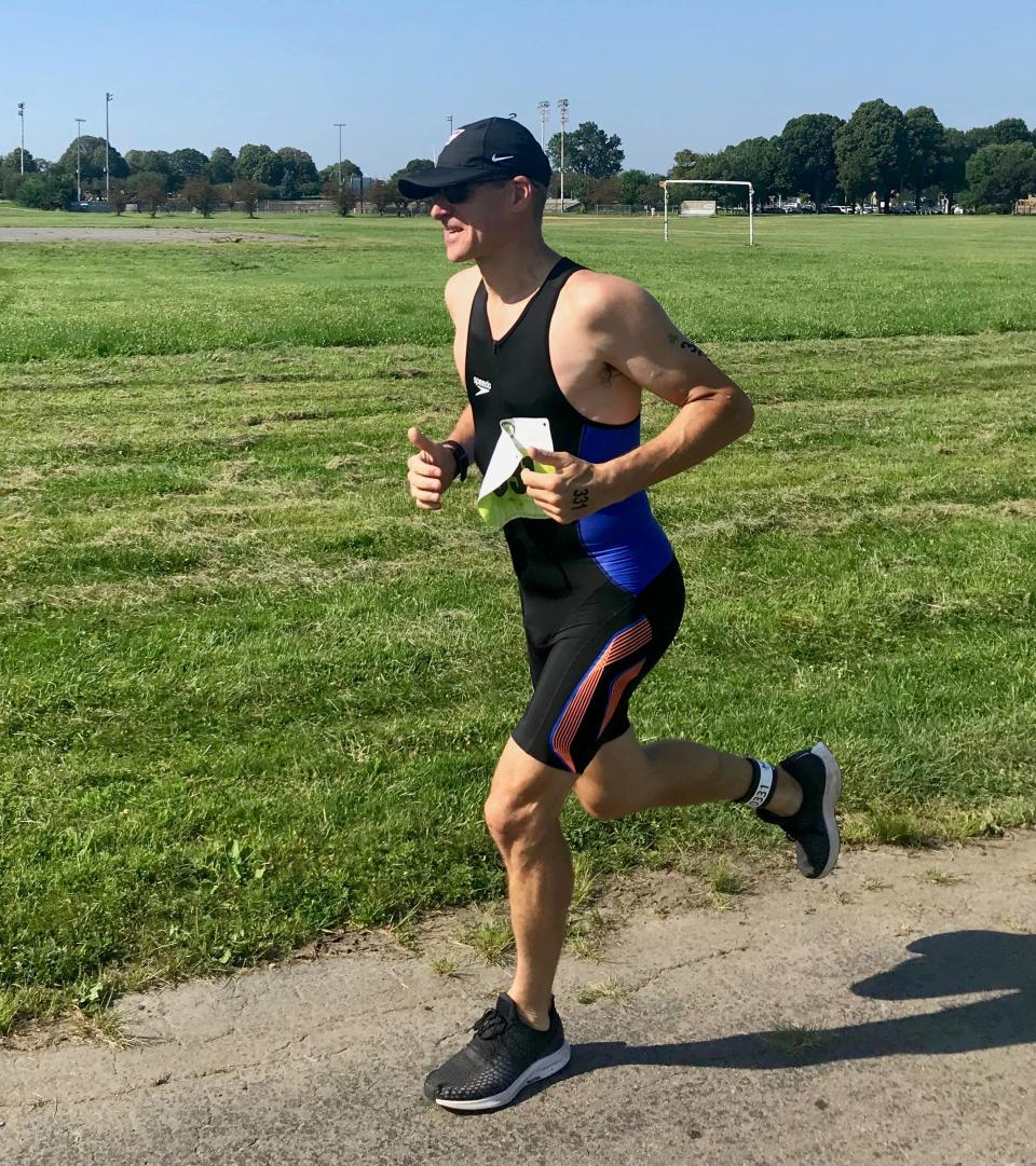 Stuart Hughes of Lancaster competes in the running portion of the 2019 Boston Triathlon.