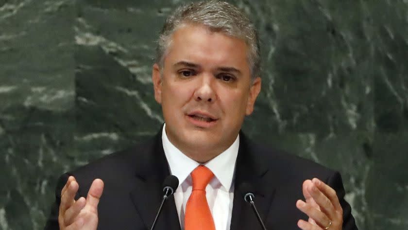 FILE - In this Wednesday, Sept. 26, 2018, file photo, Colombia's President Ivan Duque addresses the 73rd session of the United Nations General Assembly, at U.N. headquarters. Colombia's government says it is investigating a possible plot involving Venezuelans to assassinate President Ivan Duque. (AP Photo/Richard Drew, File)