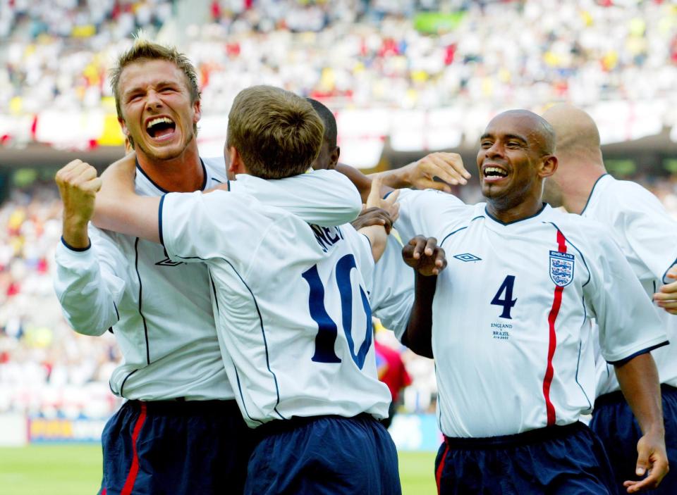 Sinclair celebrating with England players at World Cup 2002. (Getty)