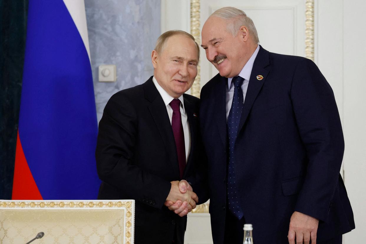 Russia's President Vladimir Putin and Belarus' President Alexander Lukashenko attend a meeting of the Supreme State Council of the Union State of Russia and Belarus, in Saint Petersburg on January 29, 2024. (POOL/AFP via Getty Images)