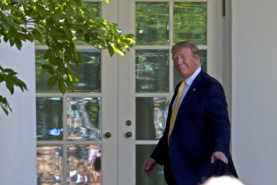 President Donald Trump leaves after speaking in the Rose Garden of the White House, Friday, June 14, 2019, in Washington. (AP Photo/Jose Luis Magana)