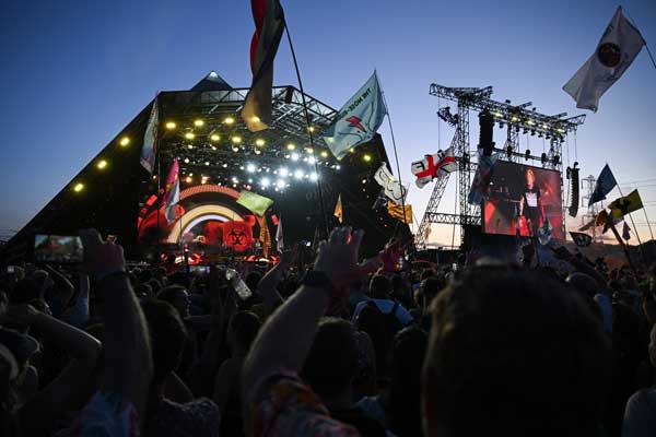 Guns N' Roses on the Pyramid Stage, shot from back in the crowd