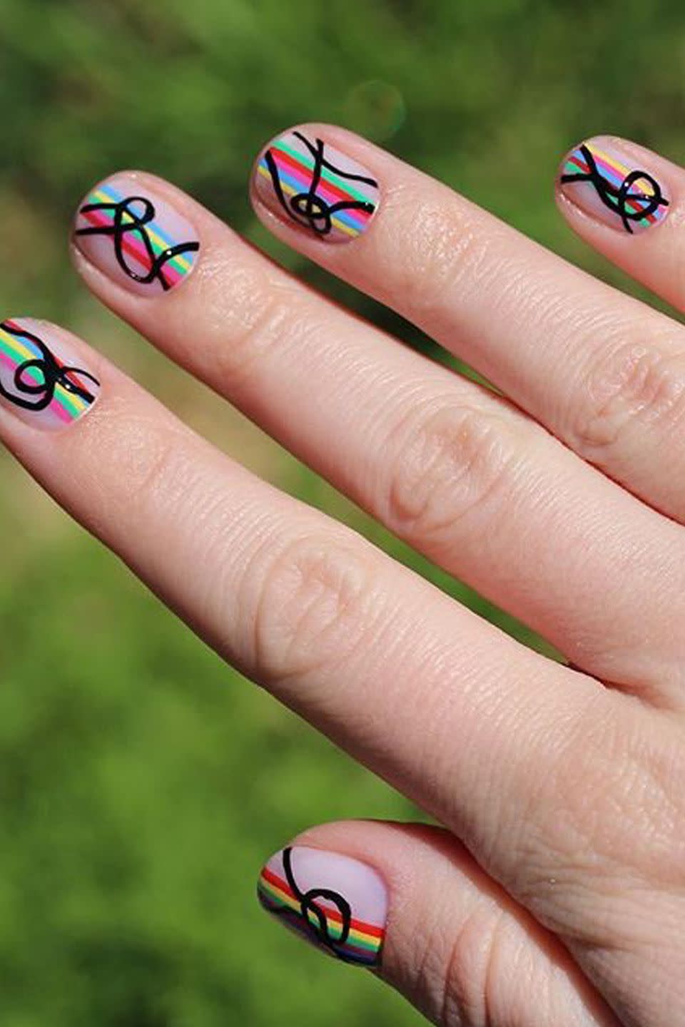 <p>All you need is a black nail polish pen to DIY this modern look. Even though it looks complicated, we promise it's impossibly easy.</p><p><strong>See more at <a rel="nofollow noopener" href="https://www.instagram.com/chelseaqueen/" target="_blank" data-ylk="slk:Chelsea Queen;elm:context_link;itc:0;sec:content-canvas" class="link ">Chelsea Queen</a>. </strong></p>