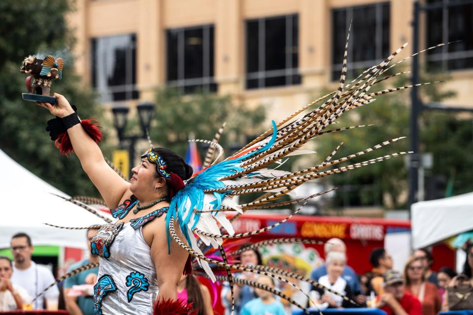 Aztec dancers perform during Latino Heritage Festival in Western Gateway Park on Saturday, September 23, 2023 in Des Moines.
