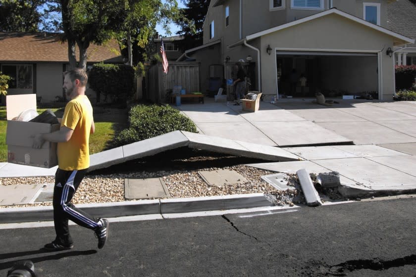 Broken sidewalk