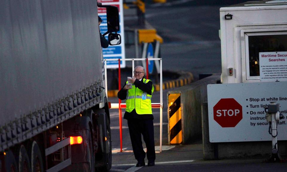 <span>Border checks are carried out on trucks at Larne Port ferry terminal in County Antrim, Northern Ireland.</span><span>Photograph: Mark Marlow/EPA</span>