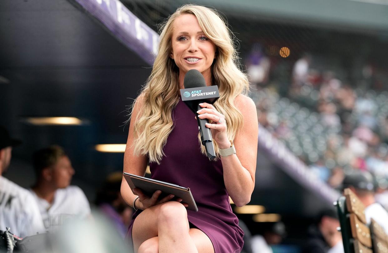 Colorado Rockies television reporter Kelsey Wingert does a spot from the first-base well before the first inning of a game against the San Francisco Giants Monday, May 16, 2022, in Denver. Wingert was hit by a foul off the bat of San Francisco Giants' Austin Slater in the ninth inning of the game. The announcer, who was seated in the first-base camera well, was taken from the game after being struck in the head by the ball.