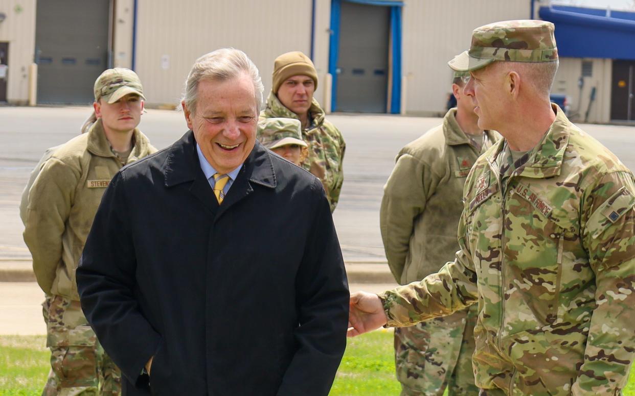 In this file photo, U.S. Sen. Dick Durbin, D-Illinois, walks with the commander of the Illinois National Guard, Maj. Gen. Rich Neely, at an event celebrating the funding of a new Base Civil Engineer Complex at the 183rd Air National Guard Wing at the Abraham Lincoln Capital Airport in Springfield.