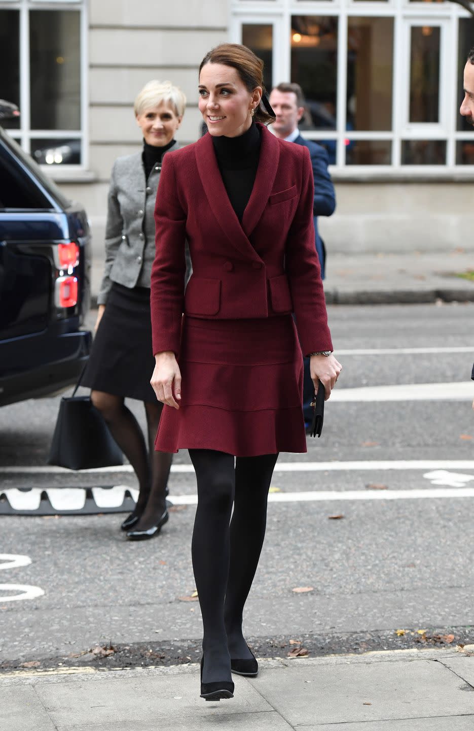 <p>Kate paid a visit to University College London wearing a skirt and blazer by Paule Ka. She paired it with Tod's suede heels and a turtleneck. The Duchess actually recycled this ensemble: she <a href="https://twitter.com/WhatKateWore/status/1065250724542586881" rel="nofollow noopener" target="_blank" data-ylk="slk:has sported the Paule Ka skirted suit on at least two previous occasions;elm:context_link;itc:0;sec:content-canvas" class="link ">has sported the Paule Ka skirted suit on at least two previous occasions</a>.</p>