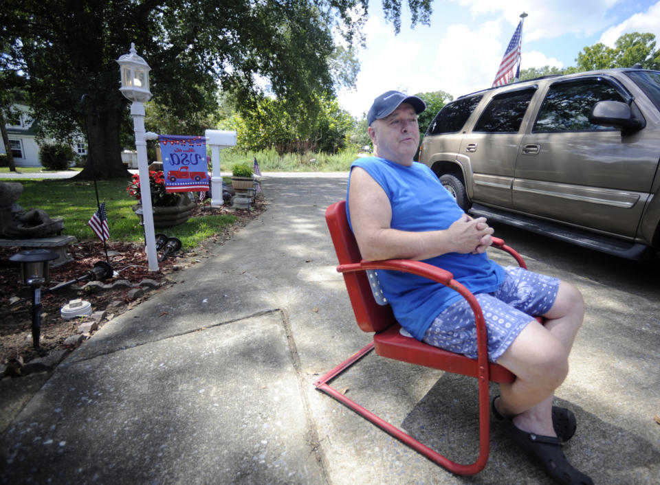 Roy Milam talks outside his home in Childersburg, Ala., on Monday, Aug. 29, 2022. Black pastor Michael Jennings was arrested at the house while watering flowers in May, and his attorney now plans a lawsuit over the incident. Milam said he feels bad over the way police treated Jennings. (AP Photo/Jay Reeves)