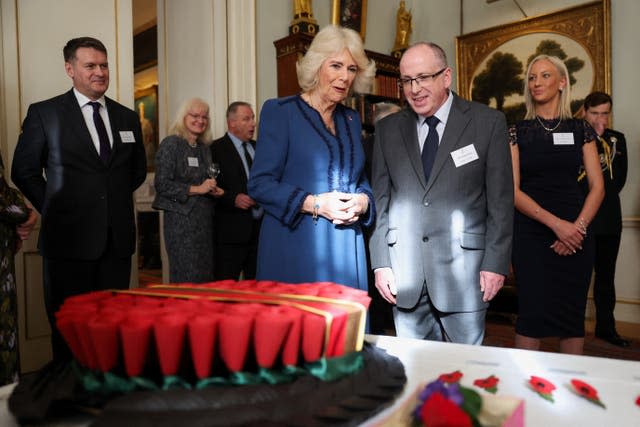 Queen Camilla hosts a celebration for centenary of Poppy Factory – London